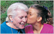 Granddaughters kiss